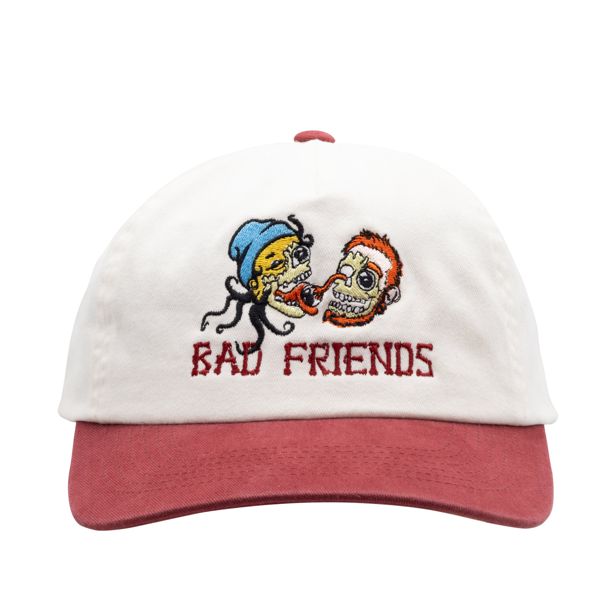 White cap with red brim featuring embroidered design of two cartoon characters and 'BAD FRIENDS' text on a white background.
